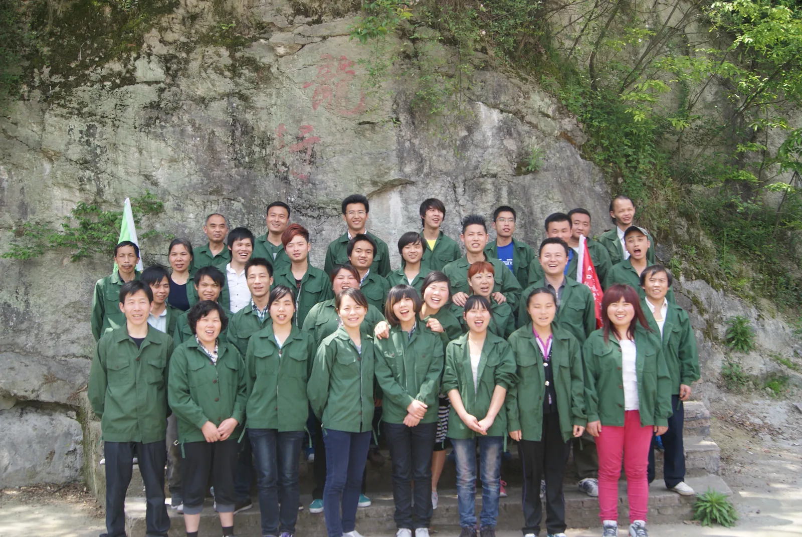 ARIS team group photo at outdoor activity site