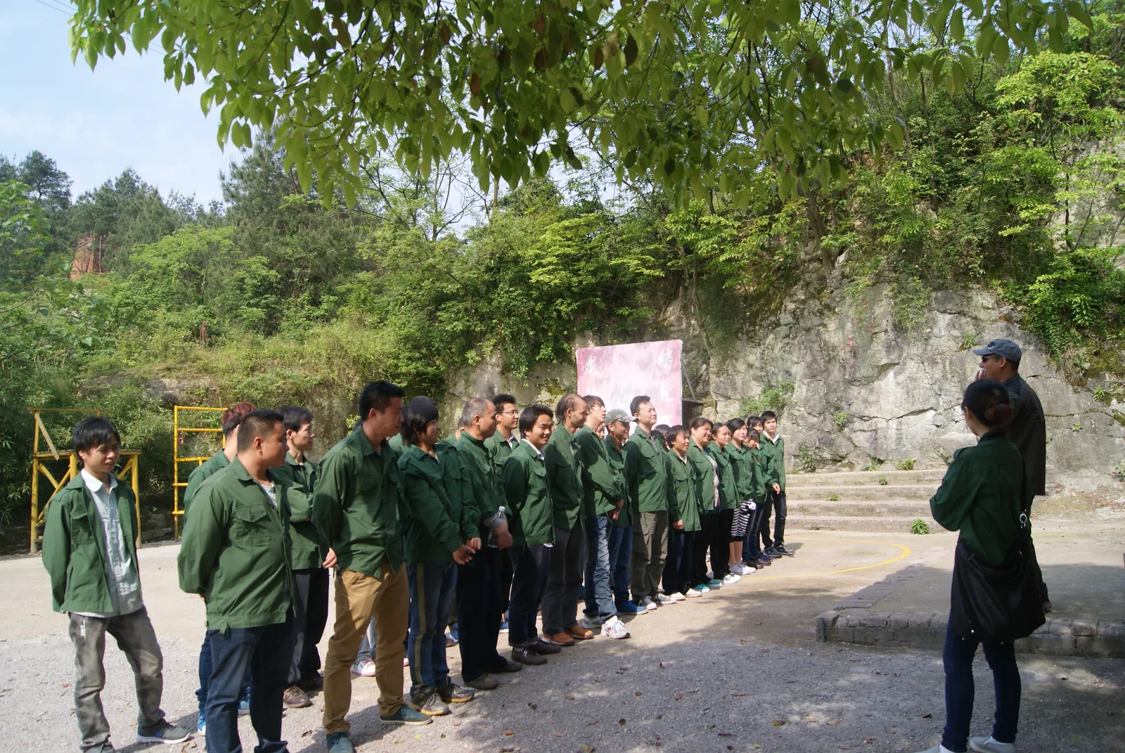 ARIS team assembled for an outdoor company activity