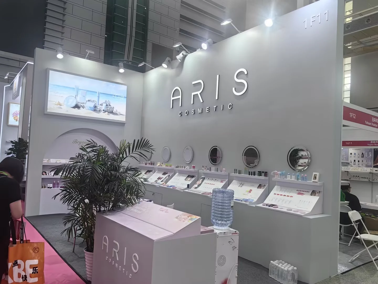ARIS Cosmetics trade fair reception desk and client discussion area